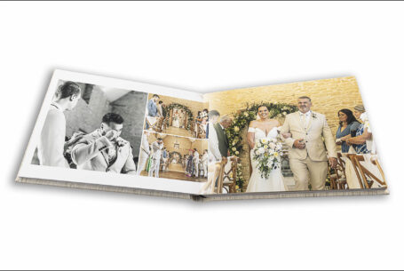 Wedding album images of the newly-weds walking down the aisle at their Cotswolds wedding