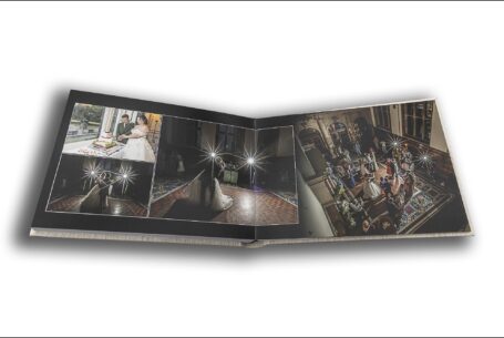 Wedding album opened at Sarah and Lewis's evening celebrations images at Keele Hall, Staffordshire.