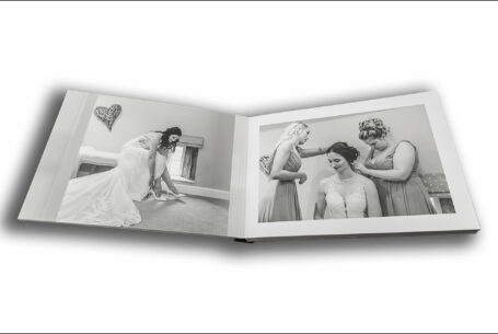 Joanne getting ready for her wedding at The Ashes Barns in Staffordshire. Black and white wedding album images by John Fox Wedding Photography