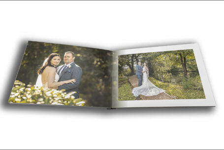 Wedding album images of the bride and groom in the grounds at The Ashes Barns in Staffordshire. John Fox Wedding Photography.
