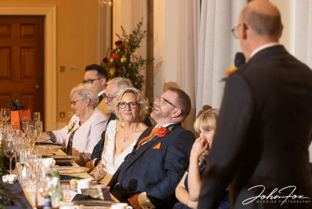 The best man's speech making everyone laugh. Joanne and Kevin's wedding at Rushton Hall.