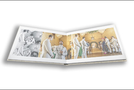 Exclusive Wedding Album opened at the pages of the wedding ceremony at Kingscote Barn in the Cotswolds for Gabrielle and William’s wedding
