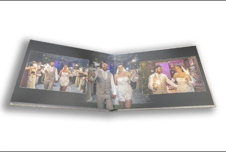 Exclusive Wedding Album images of celebrations with sparklers at Gabrielle and William’s wedding at Kingscote Barn. Gloucestershire wedding photographer, John Fox.