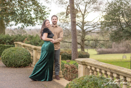Eleanor and Oliver in Kilworth House's elegant gardens with sweeping views and timeless architecture.
