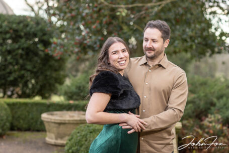Elly and Olly’s Pre-wedding Shoot at Kilworth House in Leicestershire. An outside shot by John Fox of the couple holding each other.