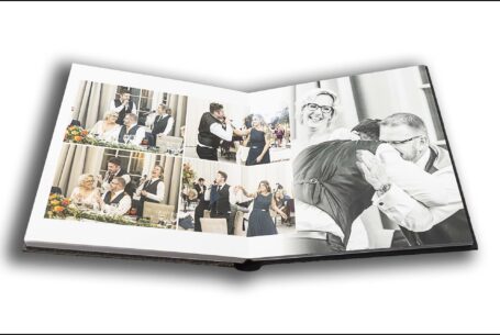Wedding album opened at a page showing the speeches at Joanne and Kevin's Rushton Hall wedding, Northamptonshire.