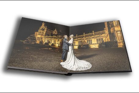 Joanne and Kevin outside Rushton Hall on the evening of their special day. Image by John Fox Wedding Photography.