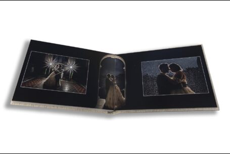 Parents Wedding Album opened at images of Sarah and Lewis's wedding evening celebrations at Keele Hall including their first dance.