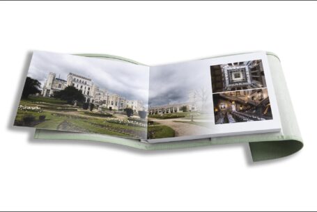 Nicole and Nicholas’s Wedding Album opened at pages showing Ashridge House in all its elegance