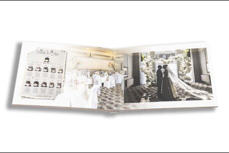 Emily and Jason’s Wedding Album opened at images of the couple having a quiet moment at the Milton Keynes' wedding venue and of the seating arrangements for the wedding guests.