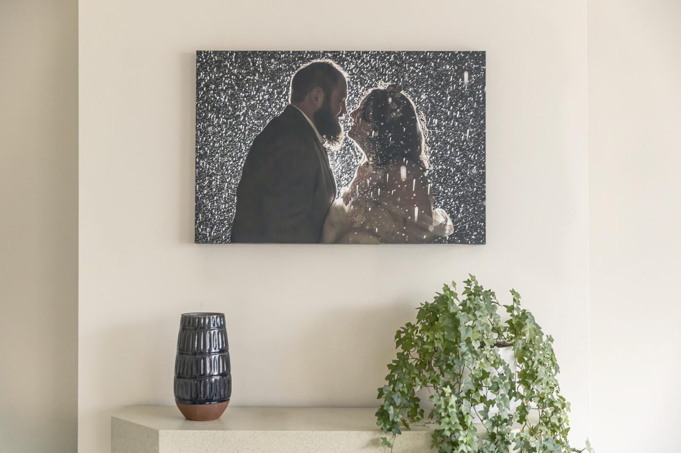 Abi and Daniel's Canvas Wrap Wedding Wall Art. An image took on their special day of them kissing in the rain.
