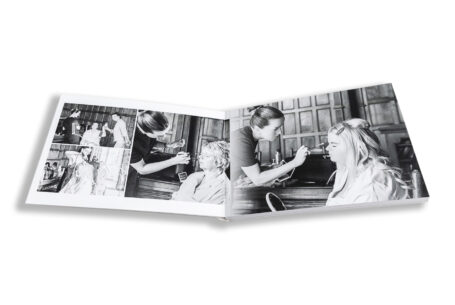 Zoe and Josh’s Wedding Album opened at the bridal preparations pages. Ashridge House, Hertfordshire wedding photographer, John Fox.