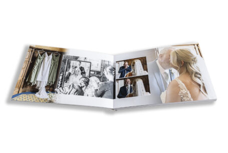 Zoe and Josh’s Wedding Album opened at a page with her father preparing to give her away at her Hertfordshire wedding.