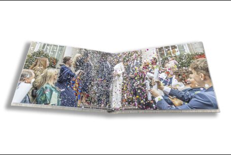 Amanda and Alex’s wedding album showing images of the couple leaving Chelsea Registry Office in London while being showered with confetti.