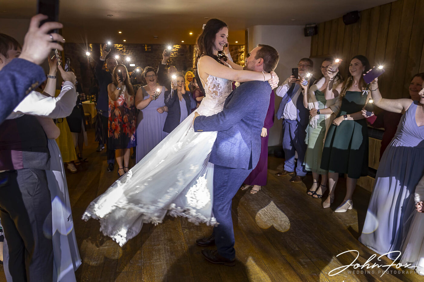 Photography package at The Ashes Barns, Staffordshire. Joanne and James’s Wedding. An image of them hitting the dance floor for their first dance.