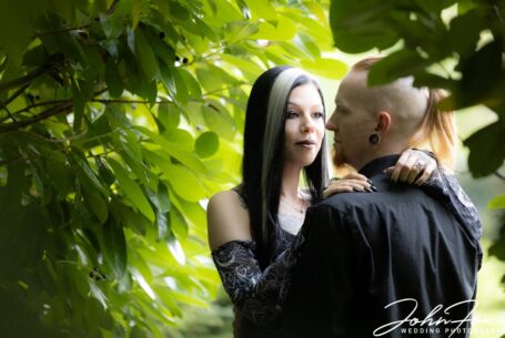 Louise and Jason, the bride and groom-to-be, holding each other on their pre-wedding shoot at Moreteyne Manor in Bedfordshire. Image by John Fox.