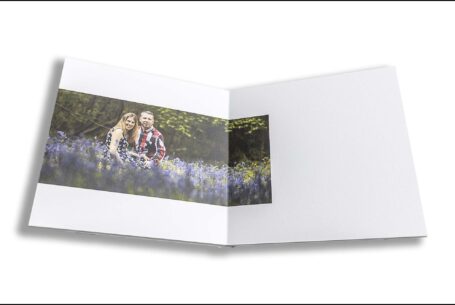 Wedding Guest Book with images from the pre-wedding shoot for Emily and Jason in a bluebell wood in Northamptonshire