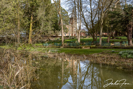 Looking across the lake and grounds at Brownsover Hall in Warwickshire. Image by John Fox.