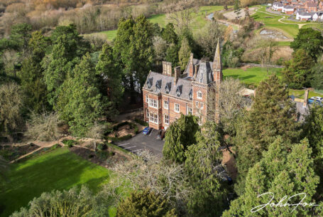 Another aerial shot of the Grade II listed Gothic-style mansion, Brownsover Hall in Warwickshire, by John Fox Wedding Photography.