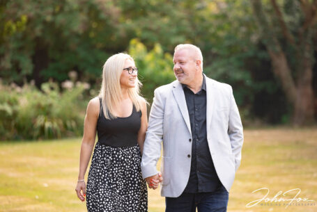 Lynn and Ian looking lovingly at each other on their pre‑wedding shoot at The Five Bells Pub in Bedfordshire