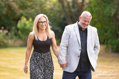The happy couple-to-be looking relaxed on their pre‑wedding shoot at The Five Bells Pub in Bedfordshire