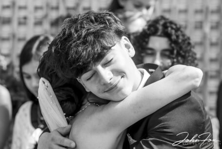Congratulations after the wedding. Figan hugging one of her wedding guests.
