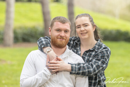 Jade and Lewis on their Pre-wedding Shoot in Milton Keynes, Buckinghamshire. Jade with her arms around Lewis.